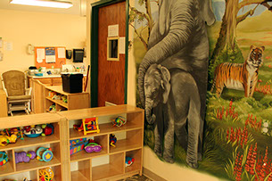 Our Infant Care Center is designed with your infant in mind.&nbsp; Bright colors and a warm atmosphere create a calming environment.